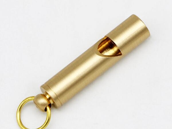Emergency brass whistle key pendant