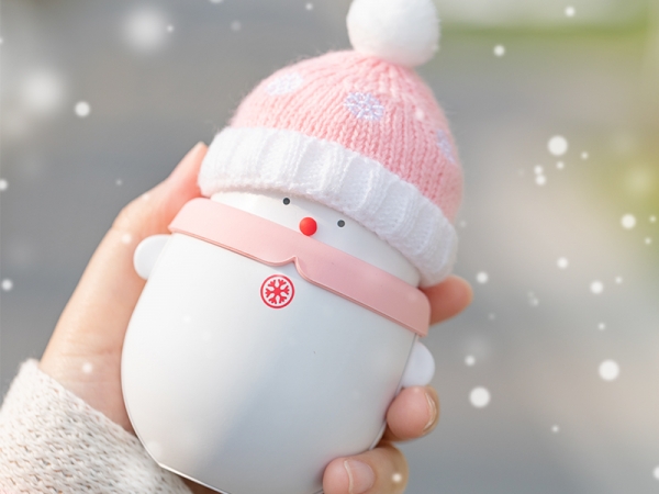Rechargeable hand warmer with snowman style