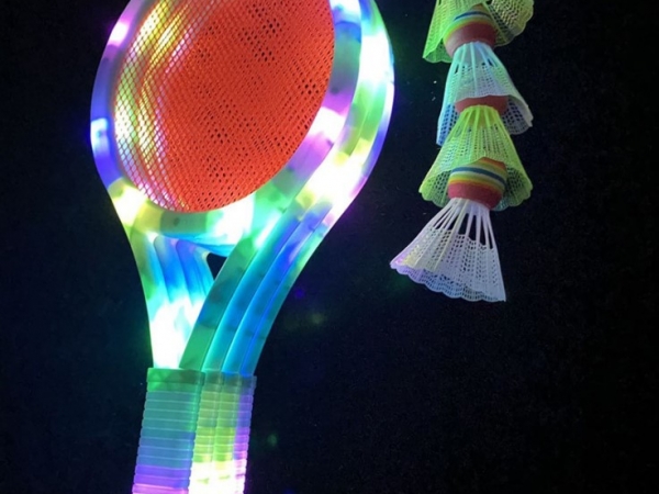 A luminous led light badminton racket dedicated to cheerleaders in badminton competitions