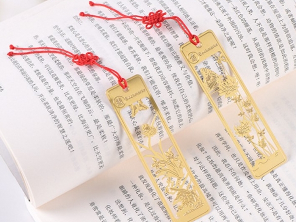 Brass hollowed out bookmark of plum, orchid, bamboo and chrysanthemum style