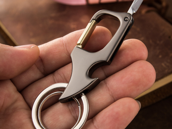 Creative multifunctional keychain bottle opening with knife